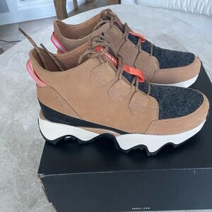 Sorel Tan and Black kinetic impact Winter Boots